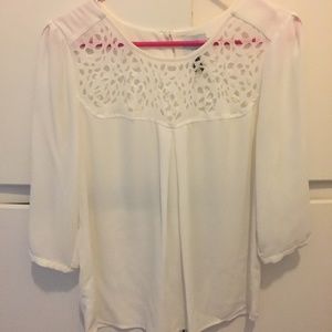 White blouse with laser cut detail